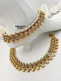 Indian kundan ghungroo Anklets comes in a pair/ Payal/ Punjabi Jhanjra/ Indian bridal payal /Bells Anklet/ Kundan Payal /Panjeb/ Indian anklets Size-Standard adult fit All items are shipped from Brampton, Ontario, Canada. If you need your item by a certain day, please reach out to us for express delivery option before you buy so that we can update the shipping for you. We kindly request to consider minor variations in colors, shades, textures as pictures displayed may slightly vary from the actual product due to digital image limitations.Please expect the possibility of some minor imperfections when buying handmade jewelry. Please contact us for any questions you might have. Thank you and Happy shopping 😊 White Wedding Anklets For Festive Occasions, Stone Work Anklets For Wedding And Festivals, Wedding Anklets With Stone Work For Festivals, White Toe Ring Anklets For Festivals, Festive Kundan Anklets With Stone Work, Kundan Anklets For Wedding And Diwali, Festive Meenakari Anklets For Wedding, Traditional White Anklets For Festive Occasions, Traditional Wedding Anklets With Stone Work