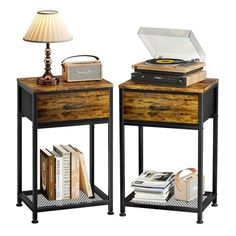 two nightstands with books and an old record player