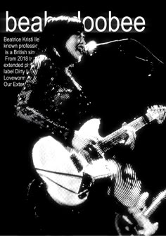 a black and white photo of a man playing an electric guitar with the words beatboobee on it