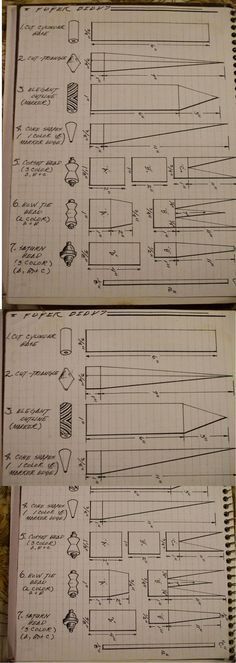 three notebooks with drawings on them sitting next to each other