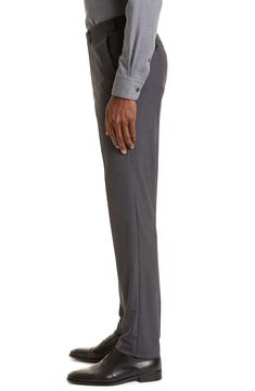 A classic fit adds timeless appeal to these flat-front trousers cut from breathable, resilient all-season wool for exceptional comfort. Zip fly with hook-and-bar closure Front slant pockets; back button-welt pockets 100% wool Dry clean Made in Turkey Men's Designer Clothing Classic Custom Fit Dress Pants For Work, Timeless Wool Dress Pants For Business, Classic Custom Fit Pants For Workwear, Classic Custom Fit Pants For Work, Classic Pants With Custom Fit For Workwear, Modern Wool Business Bottoms, Timeless Business Dress Pants With Welt Pockets, Business Dress Pants With Concealed Placket, Timeless Dress Pants With Welt Pockets For Business