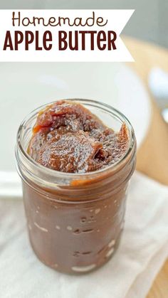 homemade apple butter in a glass jar on a napkin