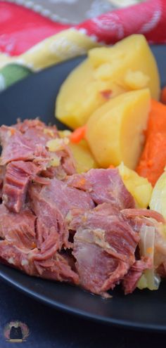 a plate with ham, potatoes and carrots on it that says boiled ham dinner instant pot recipe