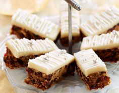 several pieces of cake sitting on top of a glass plate