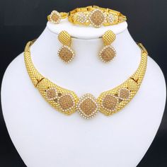 Gold Alloy Jewelry For Party, Gold Alloy Party Jewelry, Gold Wedding Jewelry Sets With Plating, Plated Round Jewelry Sets For Party, Round Plated Jewelry Sets For Party, Gold Plated Bridal Set For Anniversary, Gold Crystal Bridal Sets, Gold Crystal Bridal Sets For Gift, Gold Bridal Sets For Party