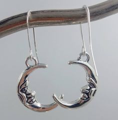 Crescent Moon Earrings Beautiful Silvery Crescent Moons dangle from Silver Plate French Hook Earwires. Perfect. Your Crescent Moon Earrings will arrive in an organza pouch with a matching polishing cloth. Gift packaging cheerfully provided upon request.🌙 Adjustable Moon-shaped Minimalist Earrings, Minimalist Moon Charm Drop Earrings, Minimalist Adjustable Crescent Earrings, Dainty Moon Charm Earrings, Minimalist Moon-shaped Metal Earrings, Silver Moon Charm Earrings For Everyday, Adjustable Half Moon Earrings, Everyday Silver Earrings With Moon Charm, Moon Earrings Silver