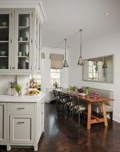 the kitchen is clean and ready to be used for dinner or other entertaining purposes in someone's home