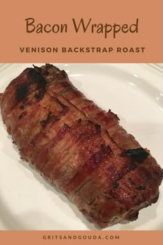 bacon wrapped venison backstrap roast on a white plate with text overlay