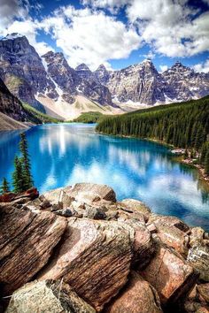 a mountain lake surrounded by rocks and trees