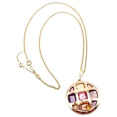 18k Yellow Gold Amethyst Citrine Garnet Tourmaline Pasha De Cartier Pendant Necklace by Cartier. 2 amethysts, 2 garnets, 2 citrine stones, 2 yellow tourmalines, 1 pink tourmaline This necklace comes with Cartier certificate of authenticity. Details: Weight: 28.4 grams Pendant Size: 40mm x 27mm Chain Length: 16" Chain Width: 2mm Stamped Hallmarks: Pendant: Cartier 750 NL8XXX serial number omitted Chain: Cartier 750 L88932 *Free Shipping within the United States* YOUR PRICE: $6,900 T3468tddd Cartier Gemstone Jewelry For Gifts, Cartier Pendant, Pasha De Cartier, Cartier Pasha, Citrine Stone, Yellow Gold Pendants, Gold Pendant Necklace, Pink Tourmaline, Chain Lengths