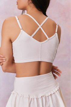 The sports bra you never knew you needed, introducing the Aiden Bra. As comfortable as it is pretty, this bra features our new signature bow print. Combining functionality and versatility with seamless double straps, a flattering scoop neck, and a simple and supportive cut, this full coverage bra is ideal for medium impact and low impact workouts from long rungs to hot yoga. White Sports Bra With Built-in Bra And Wide Straps, White Activewear With Removable Bra Pads, White Athleisure Bra With Removable Pads, White Sports Bra With Built-in Bra And Cross Back, White Yoga Bra With Removable Pads, White Strappy Yoga Activewear, White Strapped Yoga Activewear, White Workout Bra With Removable Pads, White Yoga Activewear With Straps