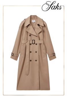 Featuring classic trench styling, the Jenna coat from Reiss is crafted of a woven cotton blend and cut in an oversized silhouette. Notch collar Epaulettes Long sleeves, belted cuffs Belted Side welt pockets Double-breasted button-front closure 73% cotton/27% polyamide Dry clean Imported SIZE  FIT About 40 from shoulder to hem Model measurements: 5'10 tall Model is wearing a US size 4 Oversized Trench Coat, Oversized Silhouette, Welt Pocket, Cotton Weaving, Double Breasted, Trench Coat, Cotton Blend, Long Sleeve, How To Wear