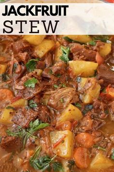 a close up of a bowl of stew with meat and vegetables