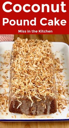 a close up of a cake on a plate with coconut sprinkled around it