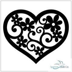 a black and white heart with flowers on it