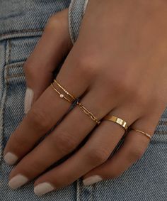 14k gold filled & made to live in. This smooth round band provides ultimate comfort & a true to size perfect fit. 3 tiny diamond replica cz pavé set stones give a beautiful sparkle. 1.2mm band Gold Ring Inspiration, Dainty Gold Rings Aesthetic, Classy Ring Stack, How To Style Rings On Both Hands, Silver Ring Inspiration, Everyday Ring Stack, Stacking Rings Ideas, Ring Stack Ideas, Ring Stacking Ideas