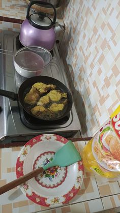 the food is being prepared on the stove in the kitchen, and ready to be eaten