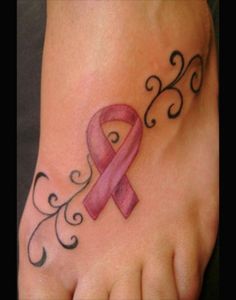 a foot with a pink ribbon on it and an ornamental design around the foot area