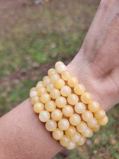 These yellow calicite bracelets are a sunny color and each come with beads that are 8mm in diameter. If you need a custom size, please let me know. Yellow Stretch Bracelet With 8mm Beads, Yellow Bracelet, Yellow Calcite, Hair Idea, May 21, Crystal Bracelet, Crystal Bracelets, Beaded Bracelet, Brown Hair