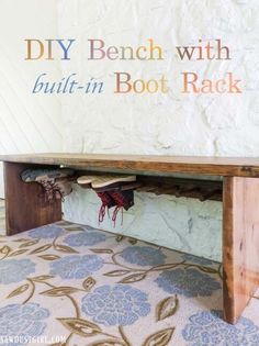 a bench with built in boot rack underneath it