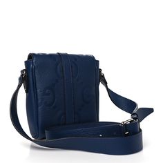 This is an authentic GUCCI Piuma Calfskin Jumbo GG Embossed Small Messenger Bag in Royale. This crossbody is crafted of navy on jumbo GG monogram canvas with matching calfskin leather trim. The bag features a matching crossbody strap and silver hardware. The top unzips to a natural fabric interior with a snap button pocket. Small Messenger Bag, Gg Monogram, Natural Fabric, Natural Fabrics, Crossbody Strap, Leather Trim, Monogram Canvas, Silver Hardware, Emboss