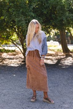 Get ready to feel fabulously boho in the Sun Oasis Skirt, cool and effortless it is quickly going to be one of your favorite pieces to wear! Soft mineral washed fabric Relaxed midi skirt silhouette Elastic drawstring waistband Large side patch pockets with convenient flap closure Exposed seams and raw edges all thorughout for added boho style Pair with: Sophie Crochet Lace Bralette, Meadow Waves Crochet Sweater and Ethereal Earth Stretch Bracelet. *Due to lighting and differences in monitors, ac Waves Crochet, Boho Essentials, Bralette Outfit, Exposed Seams, New Tops, Drawstring Waistband, Crochet Sweater, Lace Bralette, Stretch Bracelet