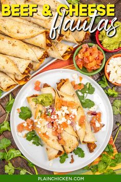 a plate with burritos and salsa on it, surrounded by other food items