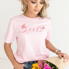 "Big Little Shirts Sorority Shirts Big Little Shirts Sorority Reveal Big Little Sorority Shirts Big Little Reveal Coquette Clothing Butterfly Shirt Butterfly Big Little Shirt Here's the link for the Big Shirt: https://www.etsy.com/JoyZeStore/listing/1281454145/big-little-shirts-sorority-shirts-big?utm_source=Copy&utm_medium=ListingManager&utm_campaign=Share&utm_term=so.lmsm&share_time=1659805730964 QUICK  FACTS oBella Canvas 3001 Unisex T Shirt o100% Airlume combed and ringspun cotton  oLight Fabric. Retail fit. oTurn garment inside out. Wash and dry normally (on cool for best results). Do not dry clean. Do not iron. oActual product color may vary slightly from the listing photo due to monitor or mobile display. SIZING oAll items are unisex so runs like men's, although not overly large. oM Big Little Shirts Sorority, Big Little Sorority Shirts, Business Terms, Coquette Clothing, Big Little Shirts, Big Little Reveal, Shirt Business, Butterfly Shirts, Big Shirt