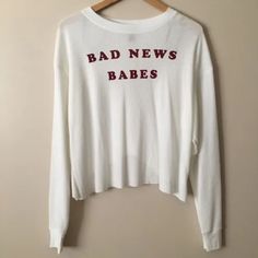 Forever 21 Bad News Babes Long Sleeve Top! Brand New, Never Worn. Very Cute And Comfortable. Size Small. -Long Sleeve White T Shirt Forever 21 Trendy Relaxed Fit Tops, Trendy Relaxed Fit Tops From Forever 21, Forever 21 Relaxed Fit Cotton Tops, Trendy Slogan Tops For Day Out, Long Sleeve Graphic Print Tops For Brunch, Trendy Forever 21 Loungewear Tops, Oversized Cotton Top For Brunch, Forever 21 Cotton Tops For Brunch, Trendy Forever 21 Tops For Brunch