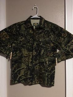 Excellent Used Condition - Like New! Youth Shirt Cabela's Size 14  (armpit-to-armpit measure is 20") Long Sleeve Button Down Button Front Pockets 35% Cotton, 45% Poly Military Style Long Sleeve Shirt With Buttons, Cotton Long Sleeve Camp Shirt With Button Closure, Long Sleeve Cotton Camp Shirt With Buttons, Military Style Shirt With Button Closure For Fall, Youth Shirt, Button Downs, Casual Button Down Shirt, Like New, Long Sleeve