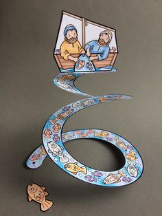 a paper cut out of the shape of a boat with two men on it and a fish