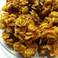 a bowl filled with lots of food on top of a table