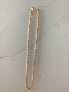 3MM Beaded Gold Filled Chain Necklace | Gold Filled | Layering Ball Gold Chain | Satellite Ball Chain| Beaded Necklace Choker | Beaded ChainHANDMADE-3MM BEADED CHAIN NECKLACE ⁙ Materials: 18K Gold filled⁙ Available Colors: Gold⁙ Measurements: 15.75"+ 2" extender or 20.25"+2" extender, 3MM BeadsHOW TO FIND YOUR PERFECT FITYour neck size is the most important measurement for determining which length will work best for you. To measure, wrap a soft tape measure around your neck, keeping the tape mea Adjustable Gold Beaded Necklace With Satellite Chain, Gold Beaded Necklace With Satellite Chain, Adjustable Gold Necklace With Ball Chain, Gold Beaded Necklace With Adjustable Chain, Adjustable Gold Ball Chain Necklace, Gold Beaded Necklace With Adjustable Chain For Everyday, Everyday Gold Beaded Necklace With Adjustable Chain, Adjustable Beaded Chain Necklace With Round Beads, Adjustable Ball Chain Necklace As Gift