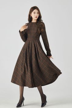 Rock the chic look with this Long Sleeve Plaid Midi Wool Dress. Stay cozy and stylish all day. 

SKU 4523 
Link in bio 

#Fashion #WinterStyle #PlaidDress #MidiDress #WoolDress #Xiaolizihandmade Fitted A-line Plaid Dress For Fall, Classic Long Sleeve Fall Dresses, Long Sleeve Tweed Dress For Fall, Formal Long Sleeve Wool Dress, Formal Long Sleeve Wool Midi Dress, Elegant Plaid Winter Dress, Fitted Wool Long Sleeve Dress, Fitted Wool Dress With Long Sleeves, Long Sleeve Midi Dress For Fall Formal Occasion