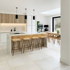 the kitchen is clean and ready to be used as a dining room or living room