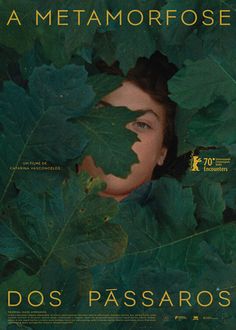 a movie poster with a woman peeking out from the leaves