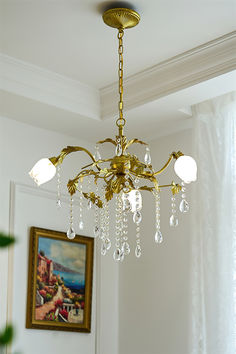 Enhance your home decor with our elegant Prosecco Chandelier. With its pleasing design and brass finish, this chandelier adds an eye-catching touch of richness and depth to any room. Featuring 3 lights and accented with lead crystal droplets, it brilliantly reflects the light of candle bulbs.