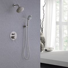 two different views of a shower head and the same wall mounted shower faucet