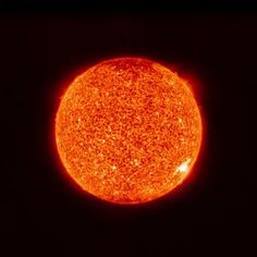 the sun taken from space, with dark background