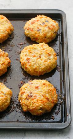 some food that is sitting on a baking pan and ready to be cooked in the oven