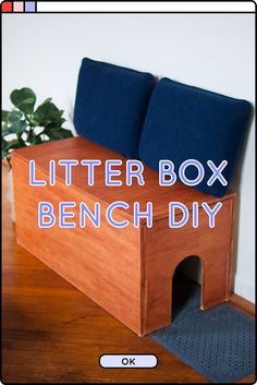 a wooden dog house with the words litter box bench diy written in blue on it