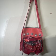 Here Is A Stunning Handmade Supple Leather Boho Southwest Hobo Long Fringe Crossbody Bag, This Opens To A Roomy Deep Compartment That Is Fully Lined With One Inside Zippered Pocket Made From Clean New Material. The Front Is Adorned With Silver Toned Metal Conchos. The Adjustable Strap And Fringe Are Made From Matching Leather. The Pictures Do Not Do Justice, You Will Be Astounded With Your New Show Stopping Bag! This Is A New Never Used Handmade Piece, Made Entirely In A Smoke Free Home In Maryl Red Satchel Shoulder Bag With Palladium Hardware, Red Shoulder Bag With Silver-tone Hardware For Evening, Red Evening Shoulder Bag With Silver-tone Hardware, Red Satchel Shoulder Bag With Silver-tone Hardware, Red Crossbody Shoulder Bag With Silver-tone Hardware, Red Festival Bag With Adjustable Strap, Red Bags With Adjustable Strap For Festival, Red Leather Festival Bag, Red Festival Bag With Removable Pouch