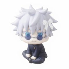 an anime figurine is sitting on the ground with blue eyes and white hair