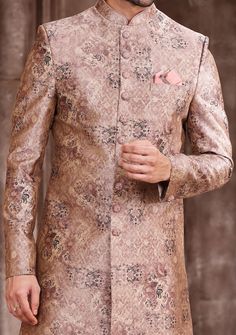 Ready-Made Sherwani With Trouser. All Over Jacquard Brocade Style Printed Fabric Top. Art Dupion Aligarhi Ready Made Trouser. Crafted in Chinese Collar Neck, and Full Sleeve. Satin Lining with Plain Work. High-Quality Matching Buttons. Please Note: The footwear shown in the picture is for presentation and photography purpose only. Color: There might be slight color variation due to lightings and flashes while photo shooting. The color may also vary because of different screen resolutions. Wash C Formal Art Silk Salwar Kameez For Festive Occasions, Festive Formal Art Silk Salwar Kameez, Formal Festive Sets With Straight Kurta, Fitted Bollywood Style Suit With Zari Work, Bollywood Style Fitted Suit With Zari Work, Designer Brocade Straight Kurta Sets, Designer Brocade Sets With Straight Kurta, Festive Brocade Designer Wear Sets, Formal Art Silk Salwar Kameez For Festivals