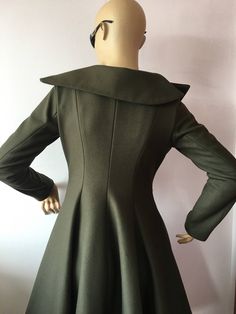 "This is a very stylish,fitted and flared wool coat . Leght 100 cm / 40 inches. Fully lined. A coat especially made to turn heads and give you that wow factor :) SIZE CHART SIZE S - US 6, UK 8, EU 36 bust: bust around 34.5\"/90cm Waist: waist around 27.5\"/70cm Hips: hips around 34.5\"/90cm SIZE M - US 8, UK 10, EU 38 bust: bust around 37.5\"/95cm Waist: waist around 29.5\"/75cm Hips: hips around 37.5\"/95cm SIZE L - US 10, UK 12, EU 40 bust: bust around 39.5\"/100cm Waist: waist around 31.5\"/8 Fitted A-line Fall Outerwear, Fitted Long Pea Coat In Solid Color, Fitted Solid Color Long Pea Coat, Solid A-line Outerwear For Fall, Fitted A-line Party Outerwear, A-line Outerwear For Winter Party, A-line Winter Outerwear For Party, Fitted Solid Color Double-breasted Wool Coat, Fitted Winter Pea Coat