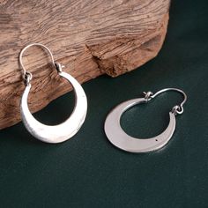 Crescent Moon Hoop Earrings,Hammered Earrings,Half Moon Earrings,Silver Hoop Earrings,Crescent Moon Jewlry,Festival Jewelry,Gift for her Metal:-Brass handmade jewelry ❥ Customers satisfaction is our biggest priority, please contact us with any questions/queries for future or existing orders, and we will do our best to make sure you are happy with your order. ❥Please make sure to add the correct address during check out. You can return your purchased item within 15 days after successful delivery. Silver Hoop Earring, Half Moon Earrings, Thick Hoop Earrings, Crescent Moon Earrings, Hammered Earrings, Festival Jewelry, Large Hoop Earrings, Moon Earrings, Jewelry Case