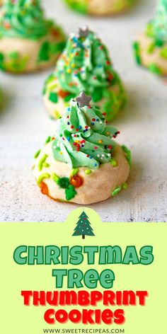 christmas tree thumbprint cookies with green frosting and sprinkles on top