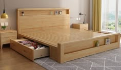 a wooden bed with drawers underneath it in a room next to a window and door