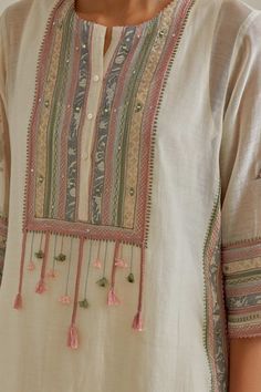 Pink and off-white cotton chanderi straight kurta with side pockets and silk thread, mirror, sequins, tassels and braids embroidered patchwork. Comes with cotton straight pant, a dupatta and a slip. - Aza Fashions Cotton Mirror, Simple Kurtis, Kurta And Dupatta, Yellow Kurta, Kurti Embroidery, Pink Kurta, Women Kurta, Simple Kurti Designs