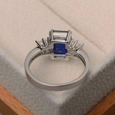 Engagement ring blue sapphire ring September birthstone | Etsy Rectangular Lab-created Sapphire Ring For Anniversary, Anniversary Rectangular Lab-created Sapphire Ring, White Gold Sapphire Promise Ring Square Cut, White Gold Square Cut Sapphire Promise Ring, Square Cut Sapphire Ring In White Gold For Promise, Rectangular Sapphire Ring With Accent Stones, Lab-created Sapphire Rings In Square Cut, Square Cut Sapphire Ring For Anniversary, Square Cut Sapphire Ring For Promise